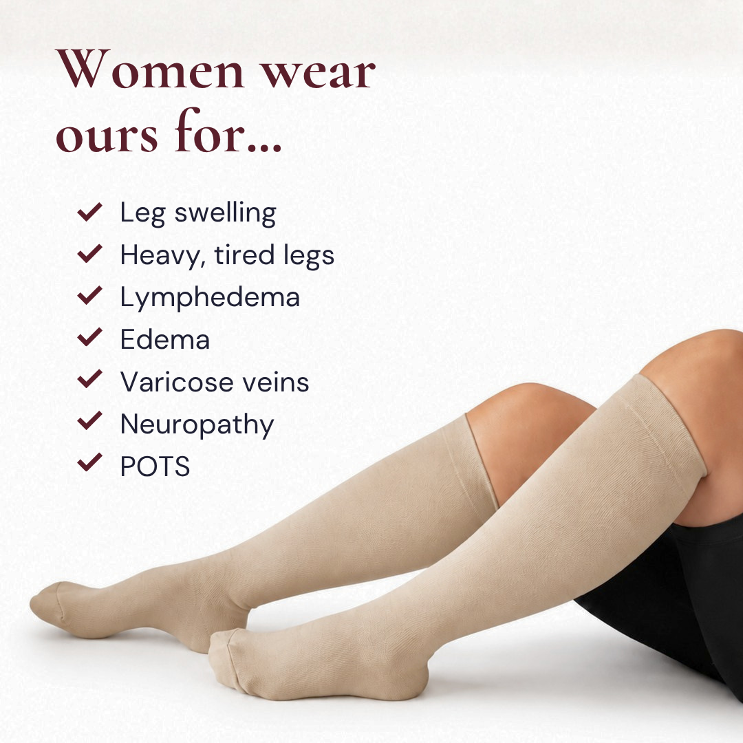Beige Movira bamboo wide-calf compression socks worn by a woman